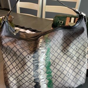 Gwen Stefani L.A.M.B. over the shoulder hand bag.